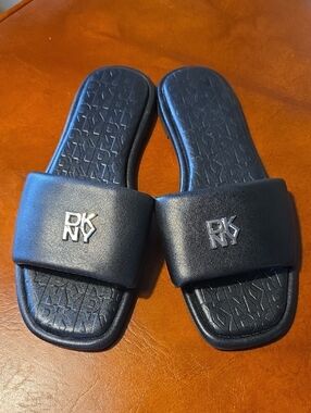 DKNY Black Slide Sandals with Silver Logo Accent Size 6